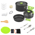 A 15-piece camping cookware set arranged on a white background, including a pot with lid, kettle with lid, frying pan, utensils, cutting board, sponge, carabiner, and storage pouch.