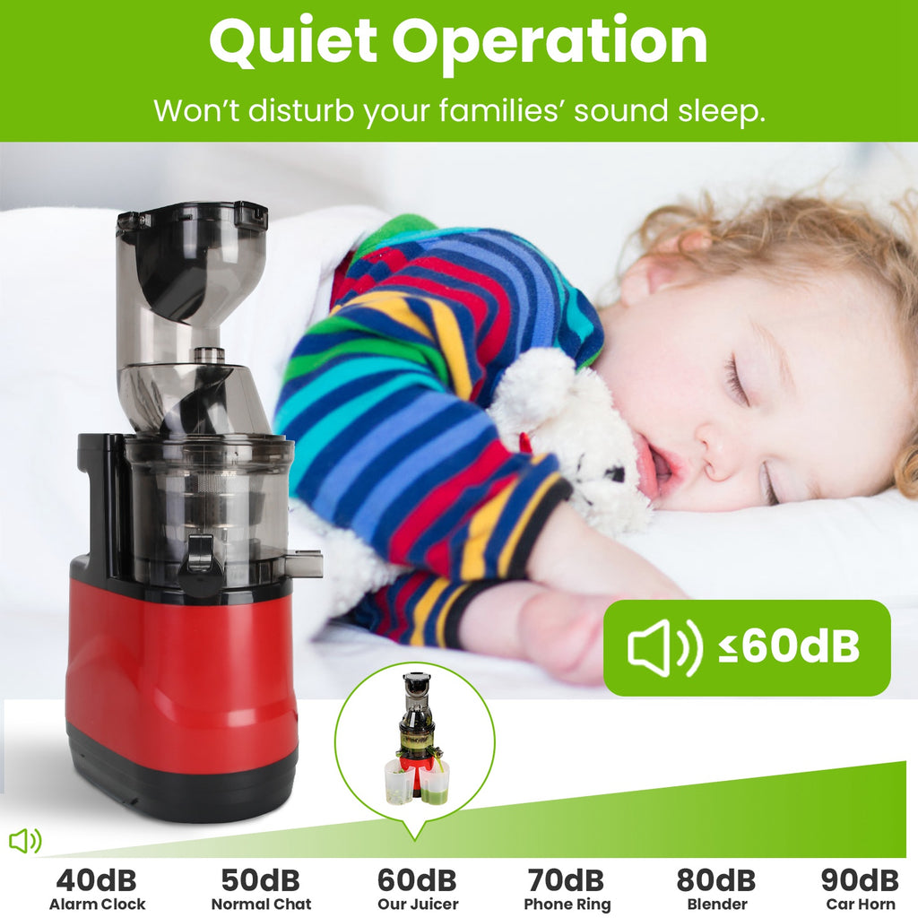 Red and black juicer with a child sleeping in the background, emphasizing quiet operation.