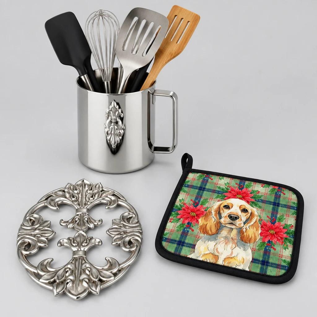 Decorative trivet, colorful pot holder, and kitchen utensils on a marble countertop.